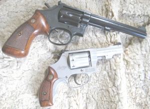 S&W K22 revolver (top) ; S&W AirLite 22LR Kit Gun (bottom)