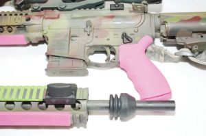 BLACKHAWK Offset Thumb Safety and Rail Mounted Thumb Rest with the neon green and pink LowPro Ladder and Slime Line rail covers with Ergo Grip in neon pink