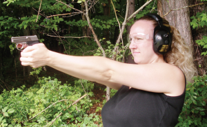 The author’s daughter, Carrie, at the range shooting the NAA Guardian in .380. She also shot several other guns that day including .38 reovolvers, .22 auto, and other .380 caliber chambered guns. This was for her selection of her first handgun.