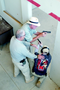 While the Custom line of Para aren’t meant as defensive or combat handguns, they would certainly serve well. Here Chris Weare shows Galco’s Mike Barham and me the proper way to clear a room.