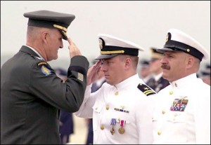 Nebraska Senate candidate Shane Osborn saluting after being awarded the Distinguished Flying Cross