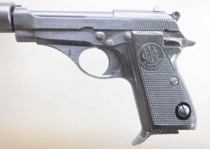 Except for the fake suppressor, it’s a standard Beretta Model 71, with the slide latch, safety, and magazine release in the usual locations.
