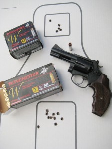 Fired from the author’s 3” S&W Model 36-6 the ten rounds of 38 special FMJ training ammo (center) and the five rounds of defensive hollow points shot to exactly the same point of aim at ten yards. 