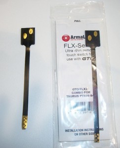 The FLX activation strip fits onto the rails of the pistol to provide touch activation of the laser.