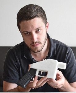 Cody Wilson, president of Defense Distributed headquartered in Dallas, TX, is shown displaying his 3-D printed single shot pistol “The Liberator.”