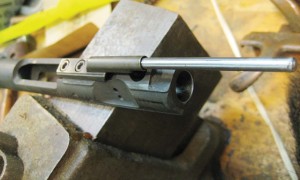 It pays to have an armorer for a friend. This bolt carrier has been modified to simplify the precise alignment of the gas tube notch in the barrel nut with the gas tube hole in the receiver. 