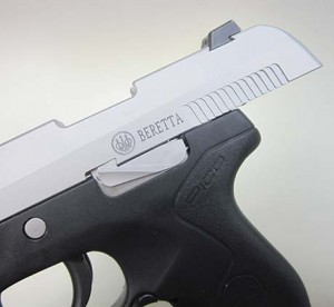 An external latch holds the slide open after the last shot. 