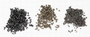 For all but the smallest rifle cartridges, rifle powders typically have extruded granules, shown here enlarged. L-R are IMR-4350, H4831SC and RL-15. 