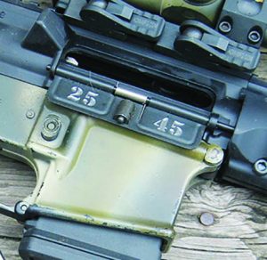 Thoughtfully, the ejection port cover is engraved with the 25-45 designation to avoid any confusion in the field or on the range. The author used 10-round MAGPUL PMAG magazines for testing the SRC .25-45.