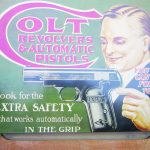 A Colt metal advertising sign, circa 1908-1910, lauded the grip-safety. 