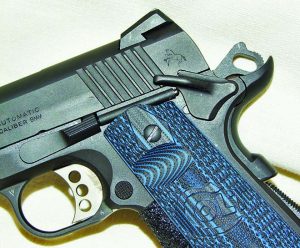Close-up of the extended single side safety and custom Colt VZ Grips which are both functional and good looking.