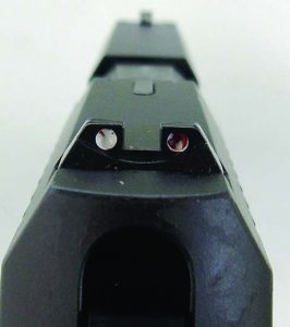 Three dot sights gave a good sight picture. The rear sight was not perfectly enameled. 