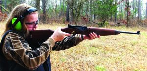 The M1 carbine version of the Ruger 10/22 proved accurate and controllable. The shooter is executing double taps. (A ten round magazine is in place.)  