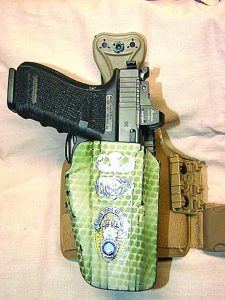 G41 MOS in author’s well-traveled custom-finished Safariland GLS holster mounted on leg shroud.