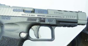 The right side view of the pistol shows the takedown lock and Picatinny rail.