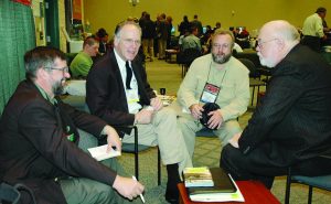 At the 2007 SHOT Show, left to right, Jim Fulmer, Tom Mason, Buddy Townsend and Winston Roland discuss the United Nations’ proposed Arms Trade Treaty.