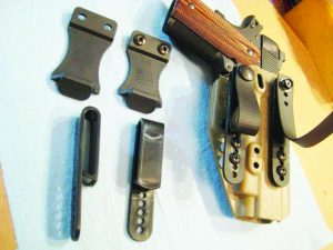 The SPEKTRE holster with the three different belt attachment systems.