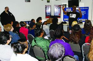 Safety instruction classroom work was required for participation at the free firearms familiarization program in the Detroit area. Here, Rick Ector, founder of Legally Armed in Detroit, discusses the basic rules of firearms safety.