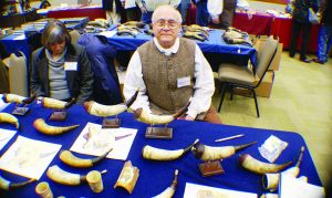 Walter Malbry with the horns he made representing Tim Tansel powder horns.