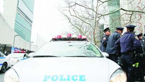 NYPD officers stage their vehicles in front of United Nations Headquarters, preparing for a counter-terrorism drill.