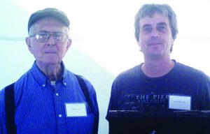 Leonard Day Jr., left, and his son John Day.