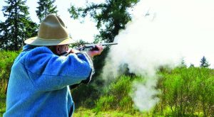 The cloud of blackpowder smoke hides the target but Nesbit had scored a hit. (Photo by Jerry Mayo)