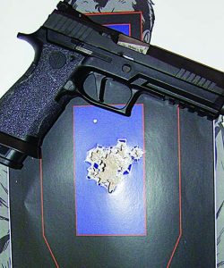 The P320 X5 proved to be accurate as this target shows; 22 rounds free style at 15 yards.