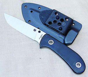 Spyderco’s fixed blade versatile Junction with its Bolatron polymer sheath, showing all the mounting holes. 
