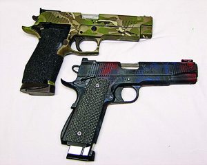 The pistols with their new look: X5 in Multicam and 1911 in custom red/blue/black Kryptek.