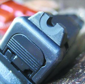 The Vickers Elite serrated rear sight from Wilson Combat allows for a fast sight picture and the tapered shape doesn’t obscure a lot of one’s target. It also has a forward ledge for one-handed slide racking.