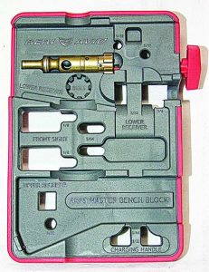 Real Avid’s Master Bench Block with a bolt positioned to remove the ejector. Note the press on the right side of the image.