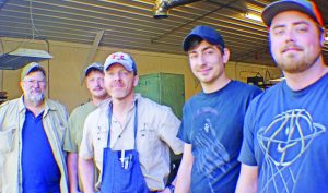 Left to right: the author standing with barrel makers Charlie Kinter, Rice Barrel Company owner Jason Schneider, Tyler Barringer and Austin Tilley.