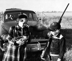 Even the youngsters have managed to get in on ringneck pursuits in South Dakota in years past. The kids in this image—Adrian holding pheasant and Von Versteg with shotgun—are probably retired by now.