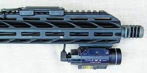 For those who shoot a “C-clamp,” put the pressure pad on the top rail with the clips provided by Streamlight. The .45ACP muzzle break is visible here. It really tamed the recoil and will work.