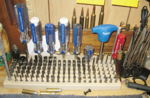 The Magna Tip Super set of screw drivers is a must for any serious hobbyist’s bench. Note the file holder at right made from old revolver cylinders.