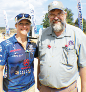 Tes Salb, manager, Marketing and Communications for FNH, left, with Jim Fulmer. She beat him by over 100 points in the modern 3-Gun match.
